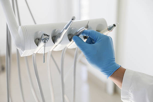 Professional Tooth Extraction technician working in Sun Village, CA